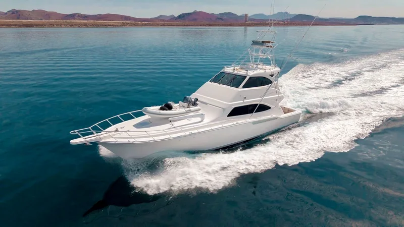 Motor yacht underway with a white wake Motor yacht underway with a white wake