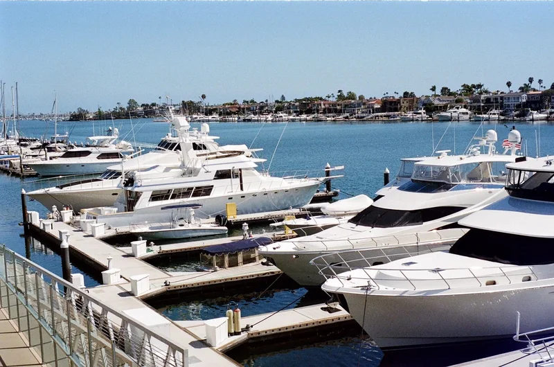 Motor yachts moored at a marina Motor yachts moored at a marina